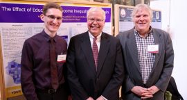 Junior Kyle Pulvermacher with UW System President Jay Rothman and Professor of Economics Scott Wallace