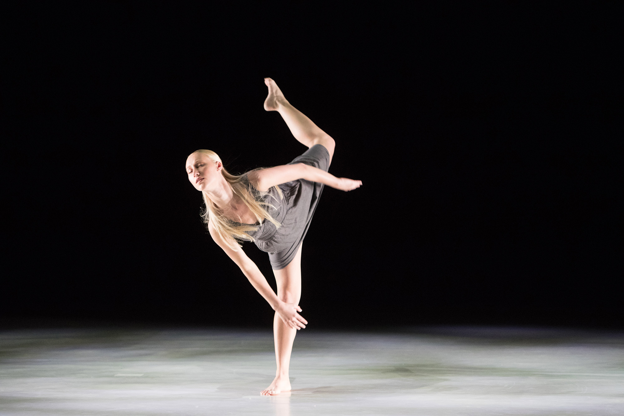 Student dancing onstage for Dansstage.